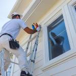 painter-professionally-painting-house-exterior-